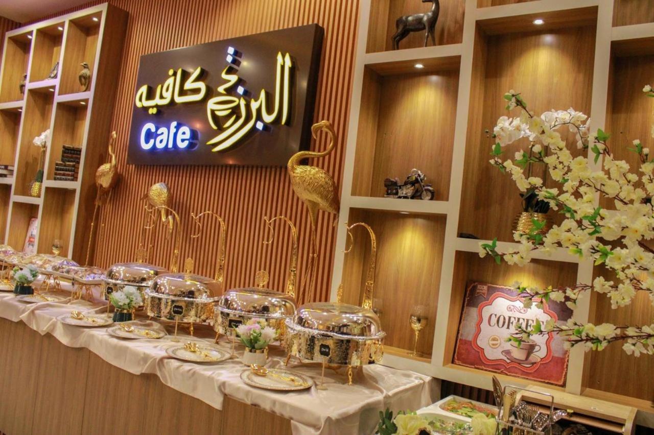 Arkan Al Barzah Hotel Apartment Sur Esterno foto